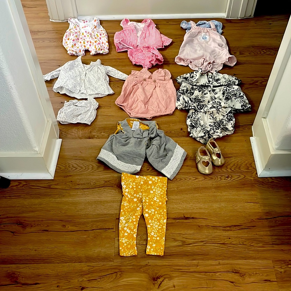 Lot of seven baby girl outfits and a pair of shoes.  Sizes are from 0-12 months